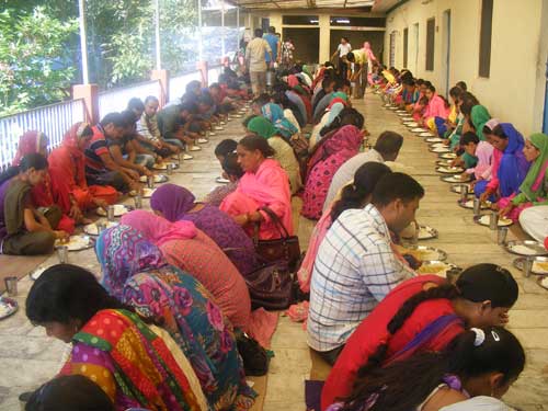 people participating in bhandara at mata chaturbhuja